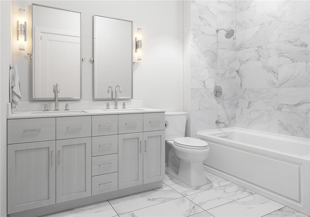 1000 Park Avenue Northeast, Unit 1904 Atlanta, GA 30326 - Photo 12 of 37 a bathroom with a toilet a sink and bathtub