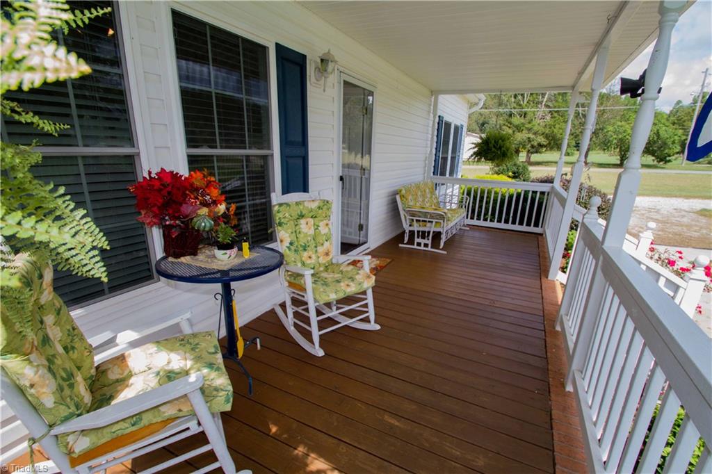 408 Allen Road Mocksville, NC 27028 - Photo 3 of 30 Relax on the Rocking Chair Front Porch with views of Pasture and Horses