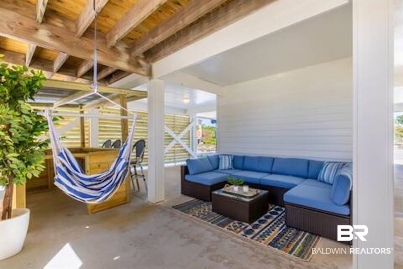 1492 Shell Lane Gulf Shores, AL 36542 - Photo 3 of 20 View of patio / terrace with an outdoor living space