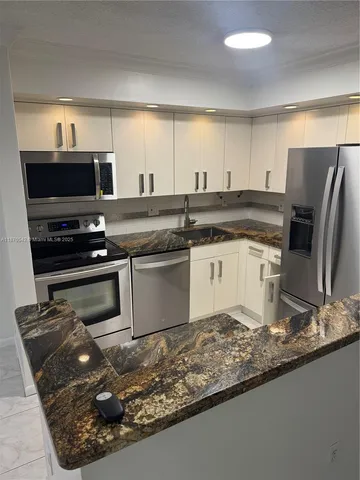 $2,150 | 9620 West McNab Road, Unit 105, Tamarac, FL 33321