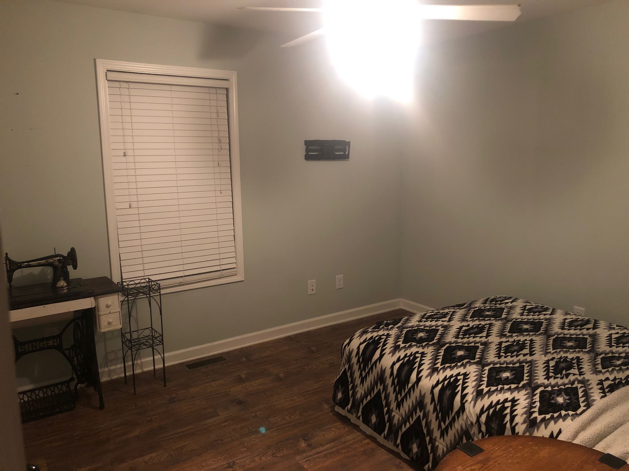 428 Meadows Road Portland, TN 37148 - Photo 7 of 9 a bed sitting in a bedroom next to a window