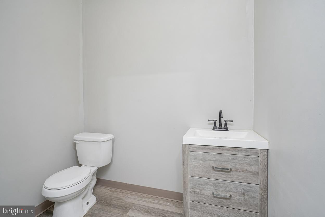 1024 Oxmead Road Eastampton, NJ 08060 - Photo 27 of 39 a bathroom with a toilet sink and mirror