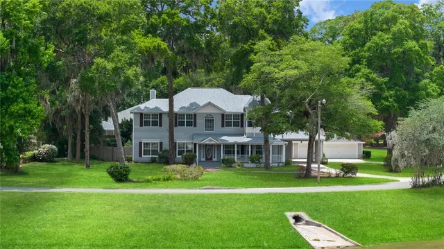 a view of a house with a big yard