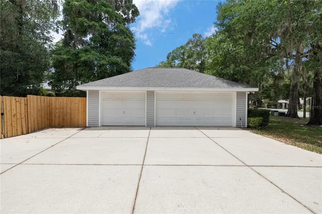 a house with trees in the background