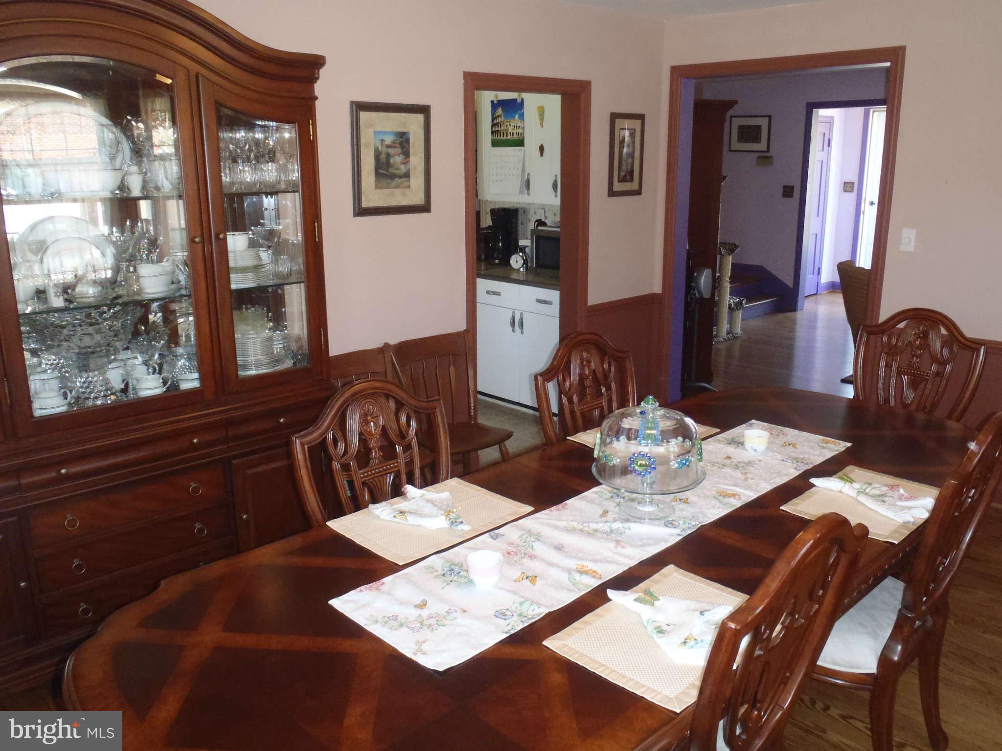 425 Lambeth Road Baltimore, MD 21228 - Photo 2 of 12 a view of a dining room with furniture