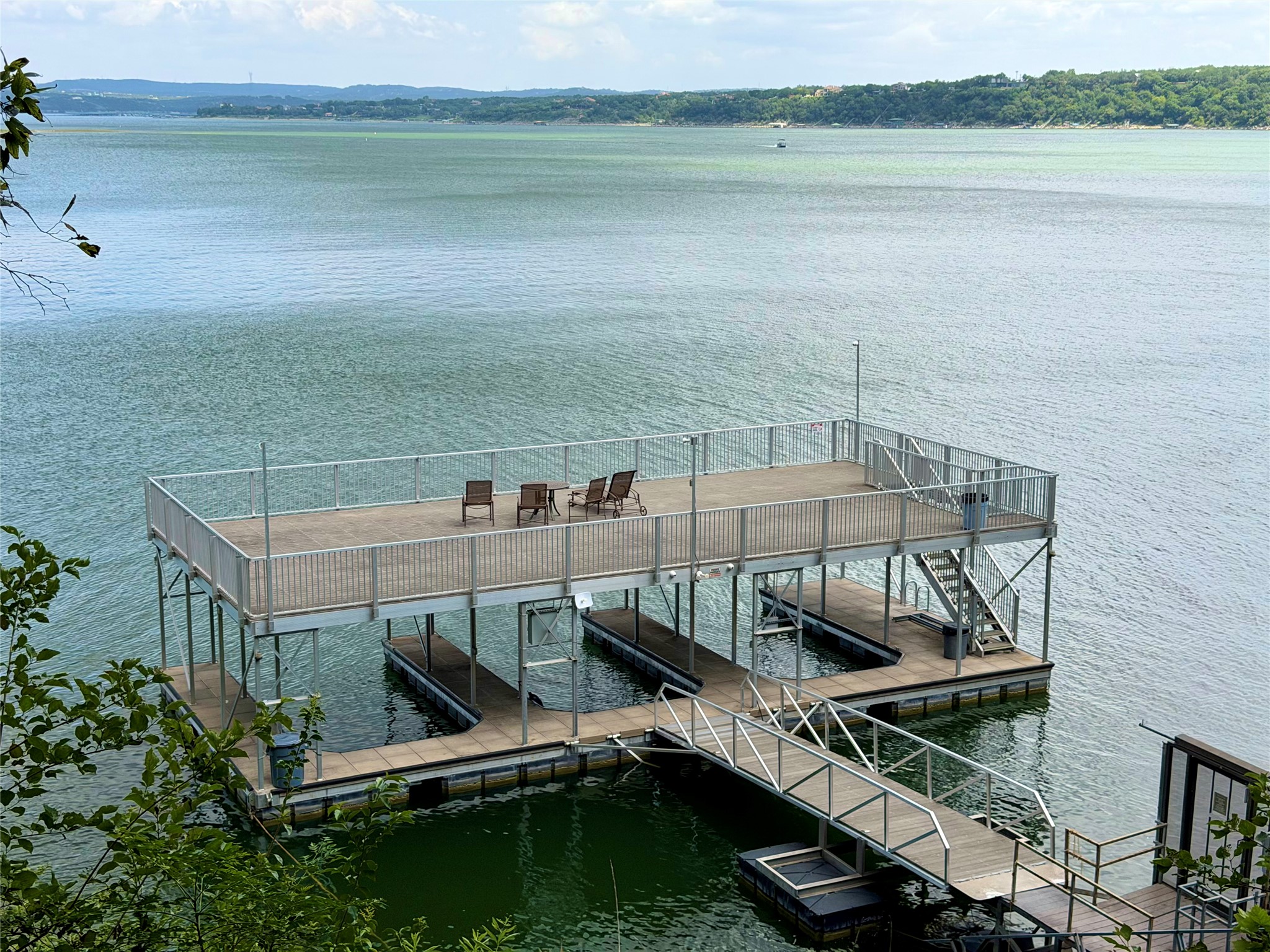 2918 Ranch Road 620 North, Unit C120 Austin, TX 78734 - Photo 32 of 34 Boasting multiple boat slips, this private day dock offers direct water access and an upper-level sundeck.