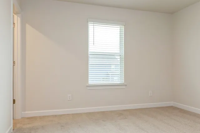 an empty room with a window