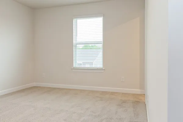 an empty room with a window