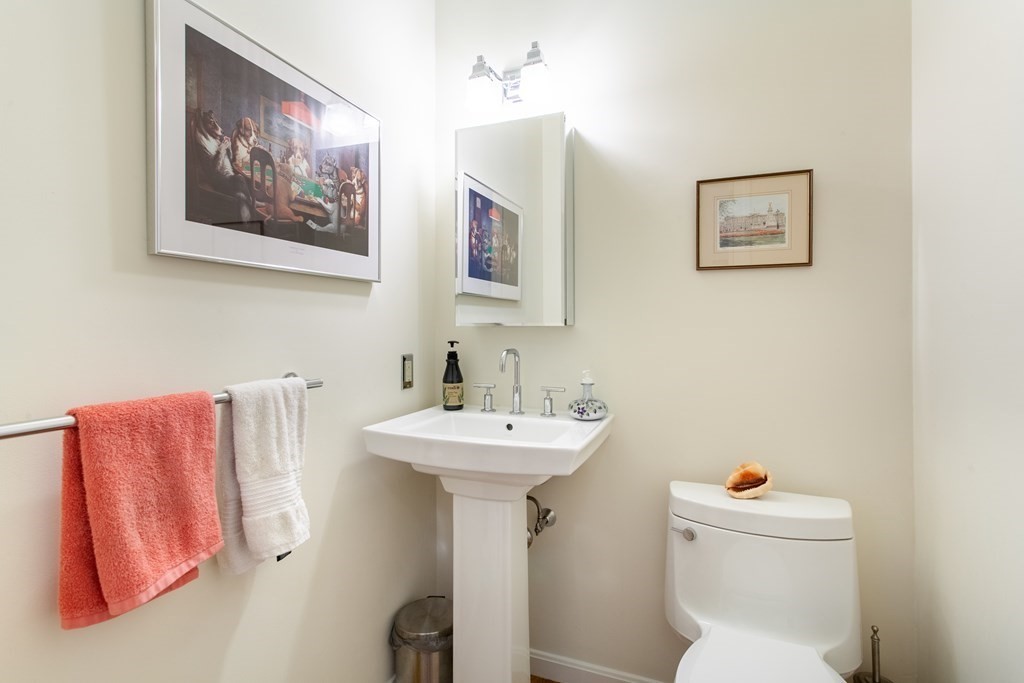 106 Hidden Valley Road Groton, MA 01450 - Photo 15 of 40 a bathroom with a sink mirror and toilet