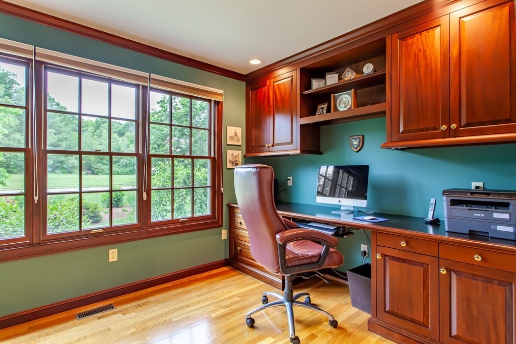 106 Hidden Valley Road Groton, MA 01450 - Photo 17 of 40 a room with furniture and a window