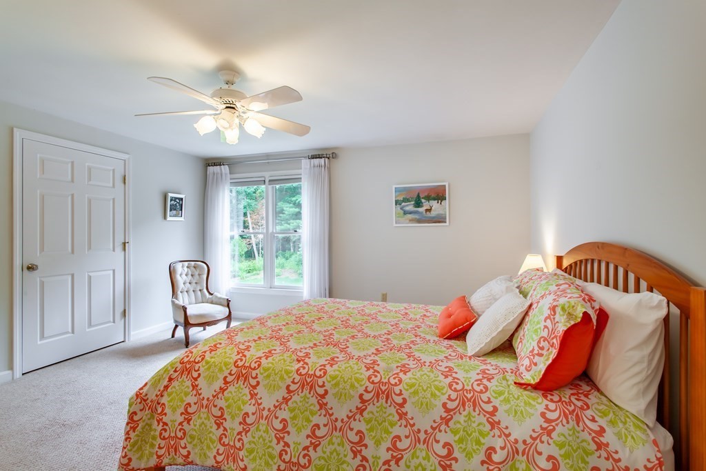 106 Hidden Valley Road Groton, MA 01450 - Photo 25 of 40 a bedroom with a bed and a window