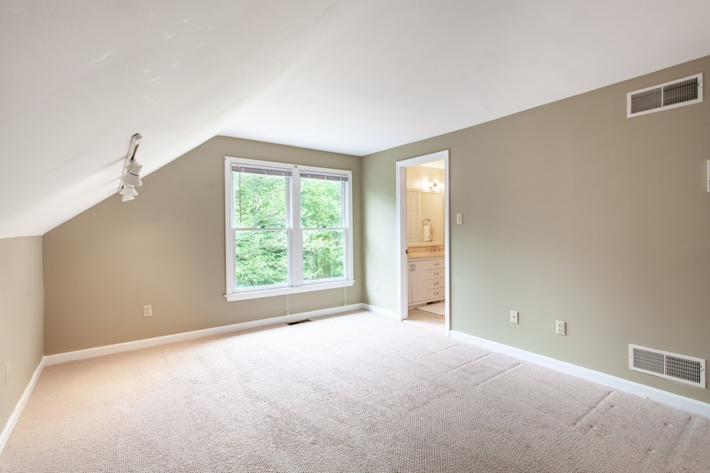 106 Hidden Valley Road Groton, MA 01450 - Photo 28 of 40 a view of a livingroom with a window