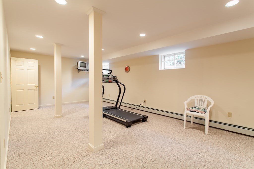 106 Hidden Valley Road Groton, MA 01450 - Photo 29 of 40 a view of a room with gym equipment