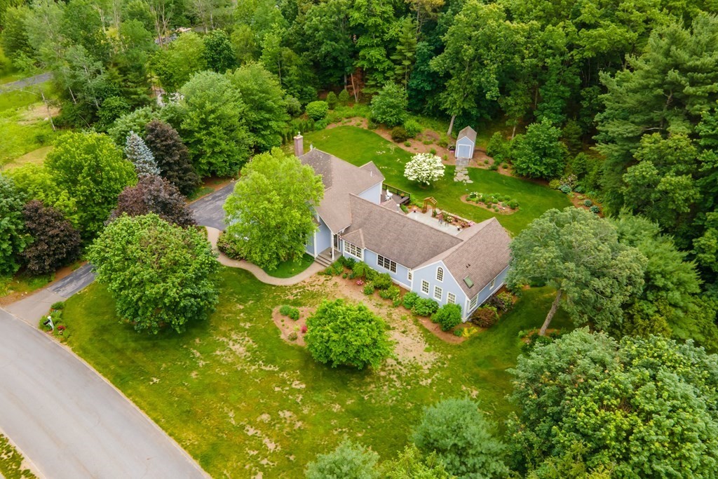 106 Hidden Valley Road Groton, MA 01450 - Photo 36 of 40 an aerial view of a house with a yard