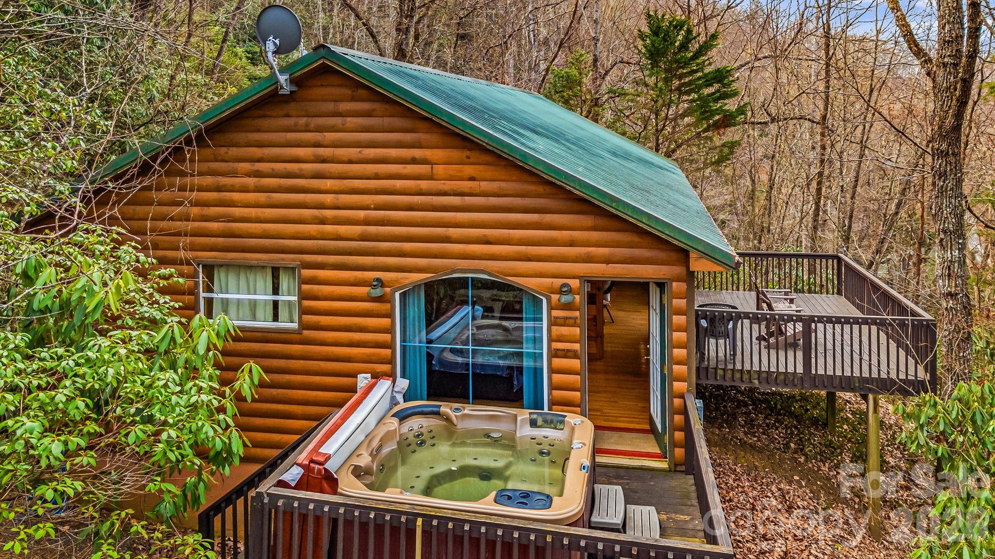 157 Crosspatch Lane Bryson City, NC 28713 - Photo 4 of 38 a view of a house with wooden fence
