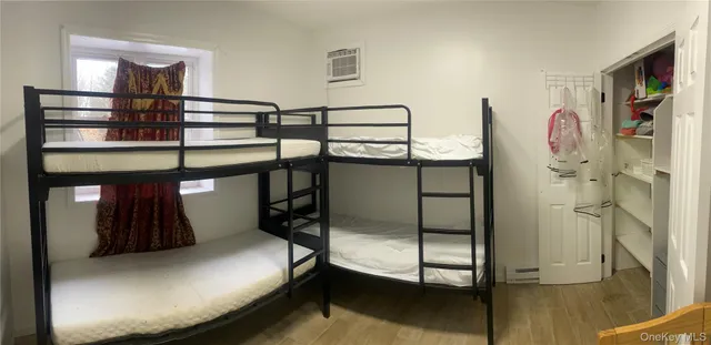a bedroom with bunk bed