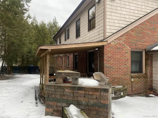 a view of house with outdoor space