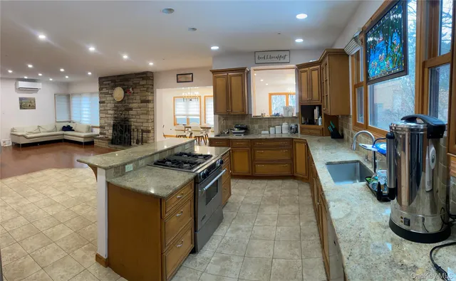 a kitchen with a stove and a sink