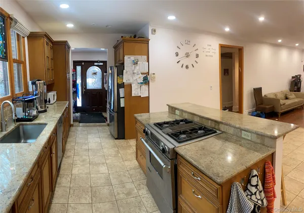 a kitchen with a stove and a refrigerator