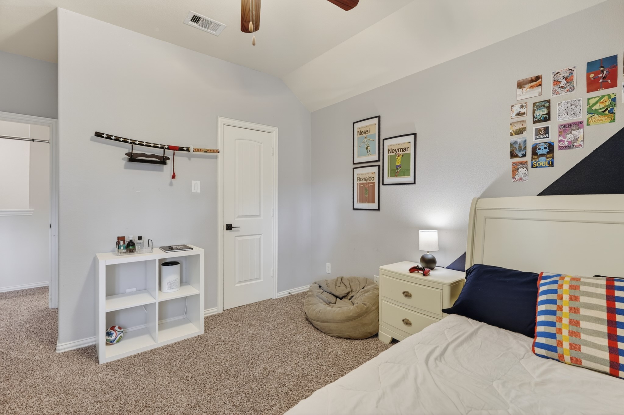 79 West Jagged Ridge Circle Spring, TX 77389 - Photo 35 of 50 This additional angle of the secondary bedroom showcases its ample closet space and the room's overall layout, which comfortably accommodates a bed, dresser, and desk. It's a bright, functional space that's ready to grow with your family.