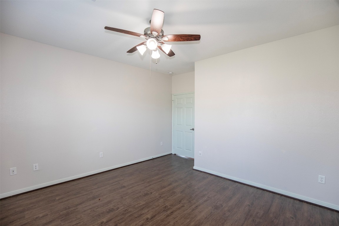 2016 H Avenue Dickinson, TX 77539 - Photo 20 of 30 a view of an empty room with wooden floor