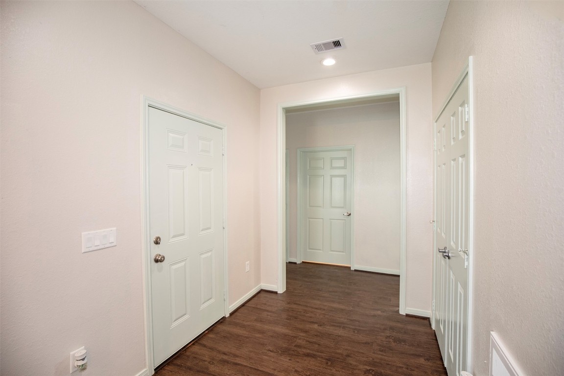 2016 H Avenue Dickinson, TX 77539 - Photo 6 of 30 a view of a hallway with wooden floor