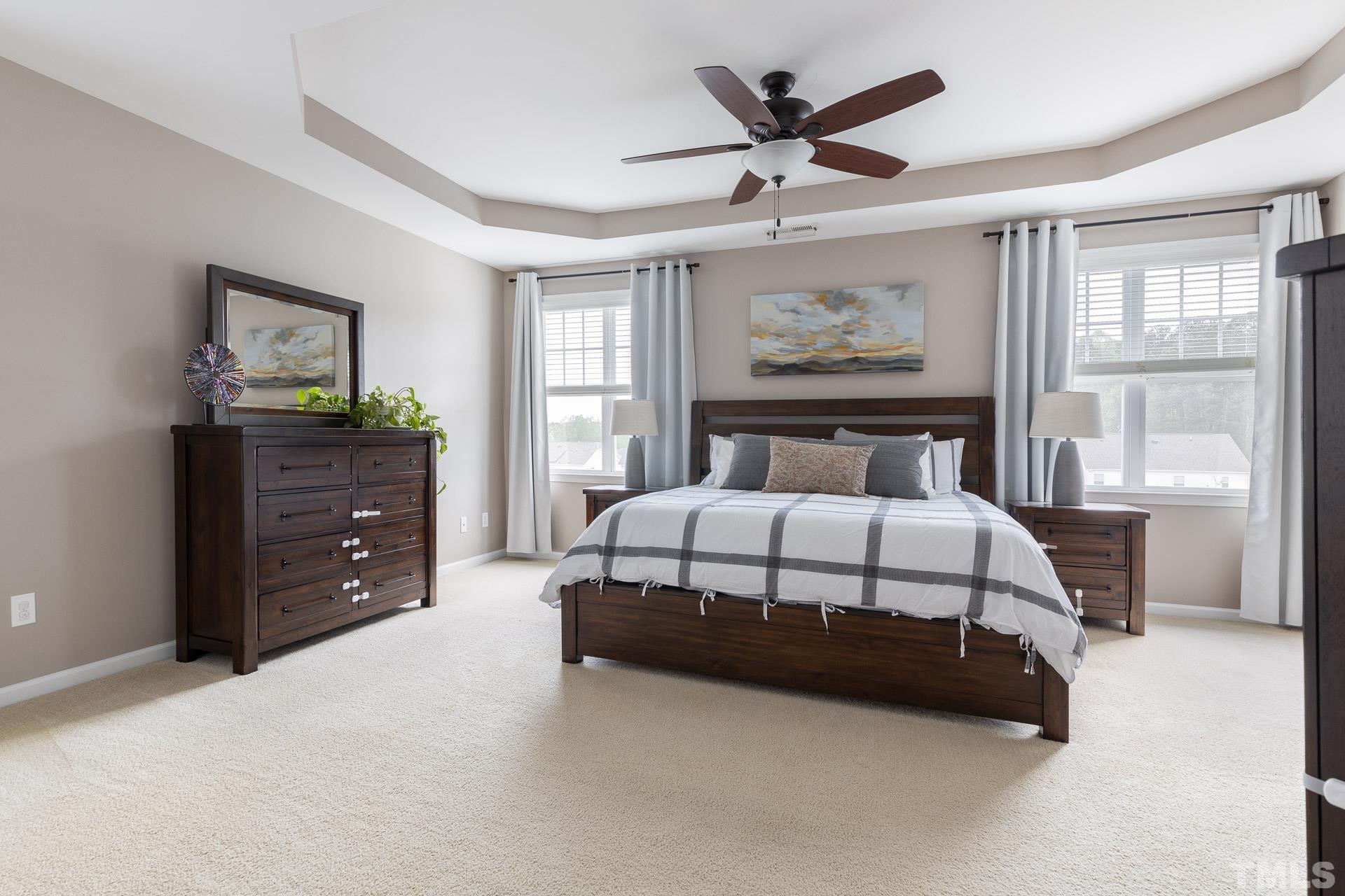 1148 Chapanoke Road Raleigh, NC 27603 - Photo 21 of 47 a bedroom with a bed and window