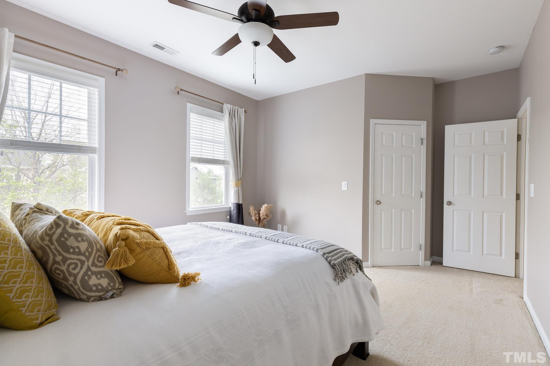 1148 Chapanoke Road Raleigh, NC 27603 - Photo 31 of 47 a bedroom with a bed and window