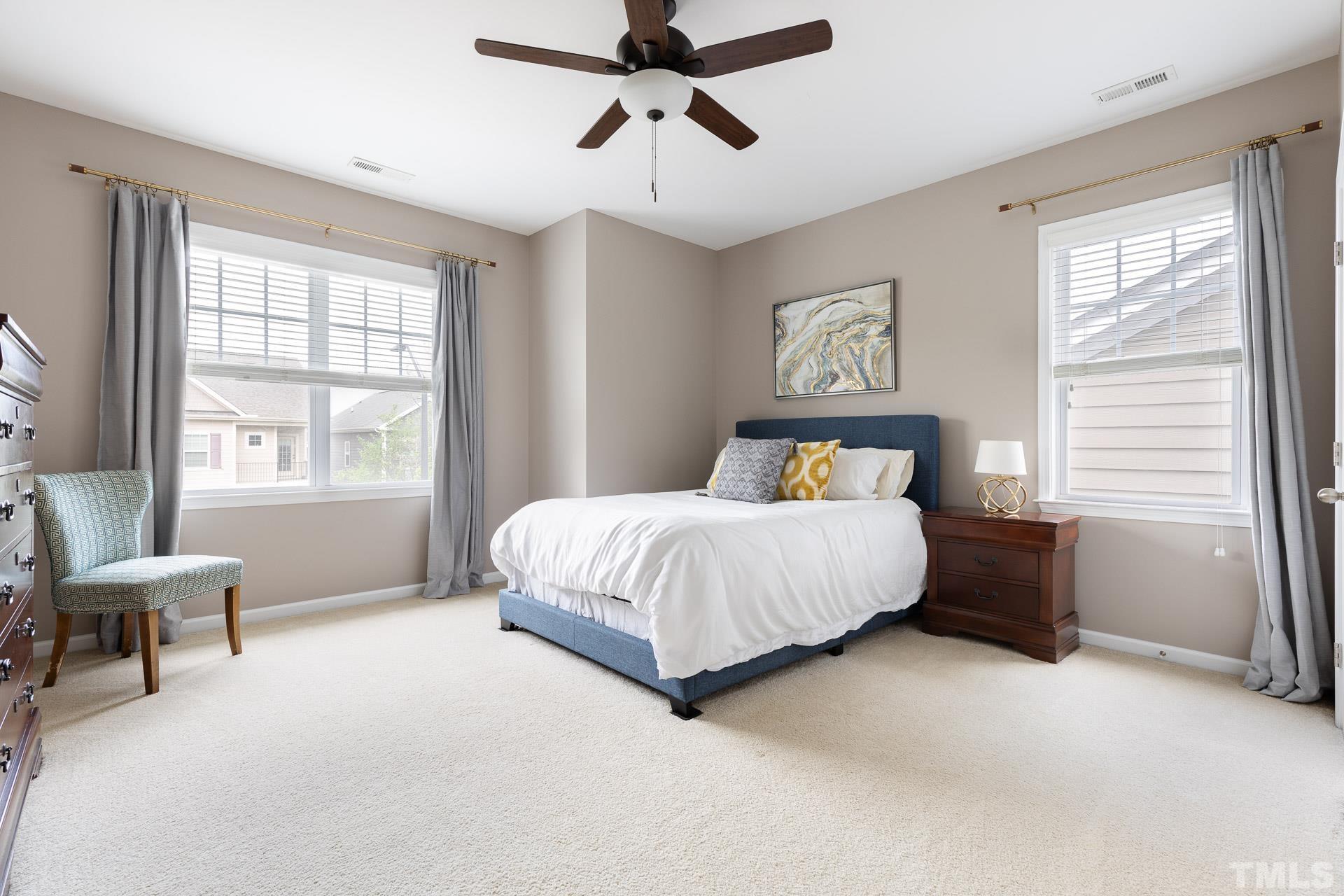 1148 Chapanoke Road Raleigh, NC 27603 - Photo 33 of 47 a bedroom with a bed and window