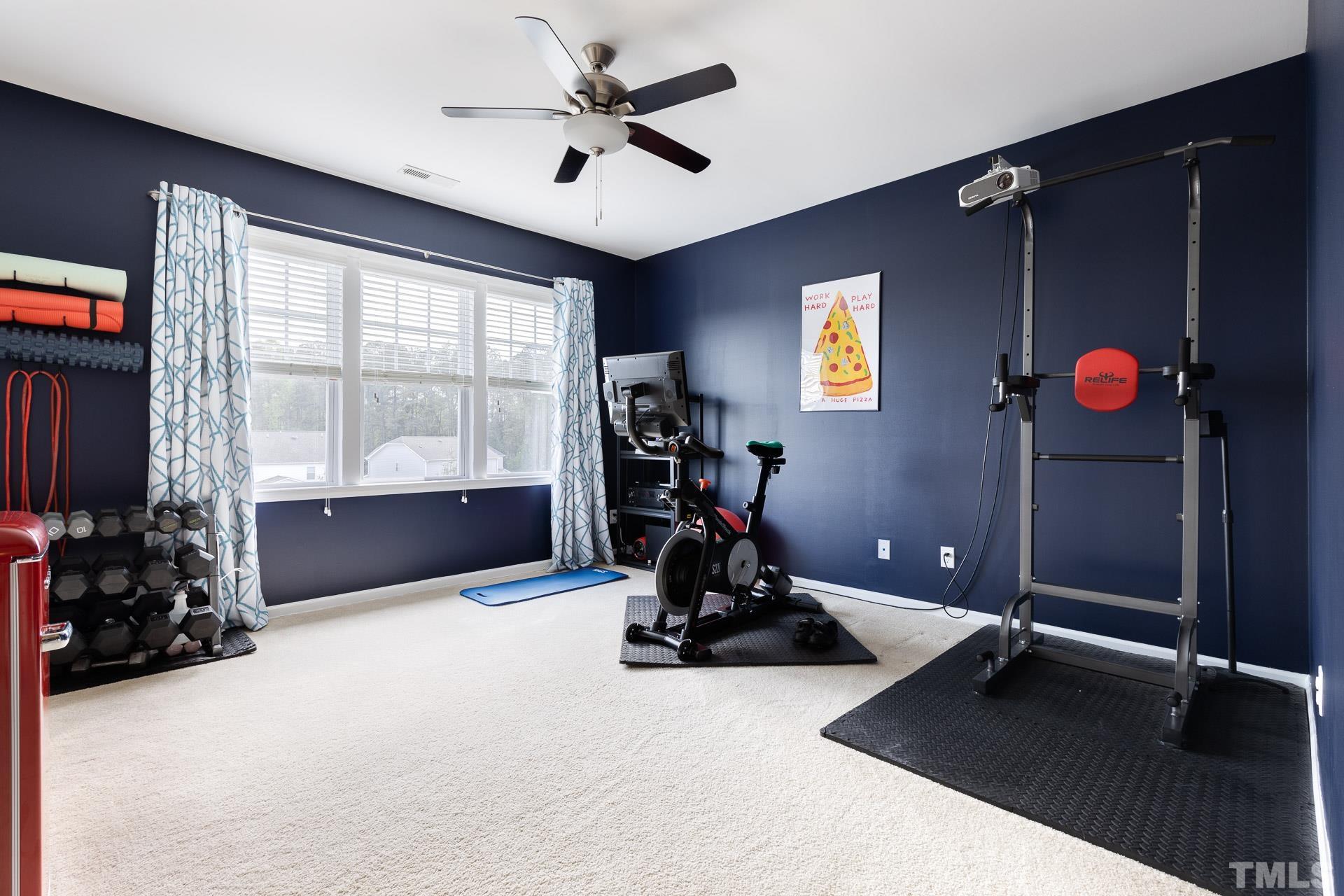 1148 Chapanoke Road Raleigh, NC 27603 - Photo 34 of 47 a view of a room with gym equipment