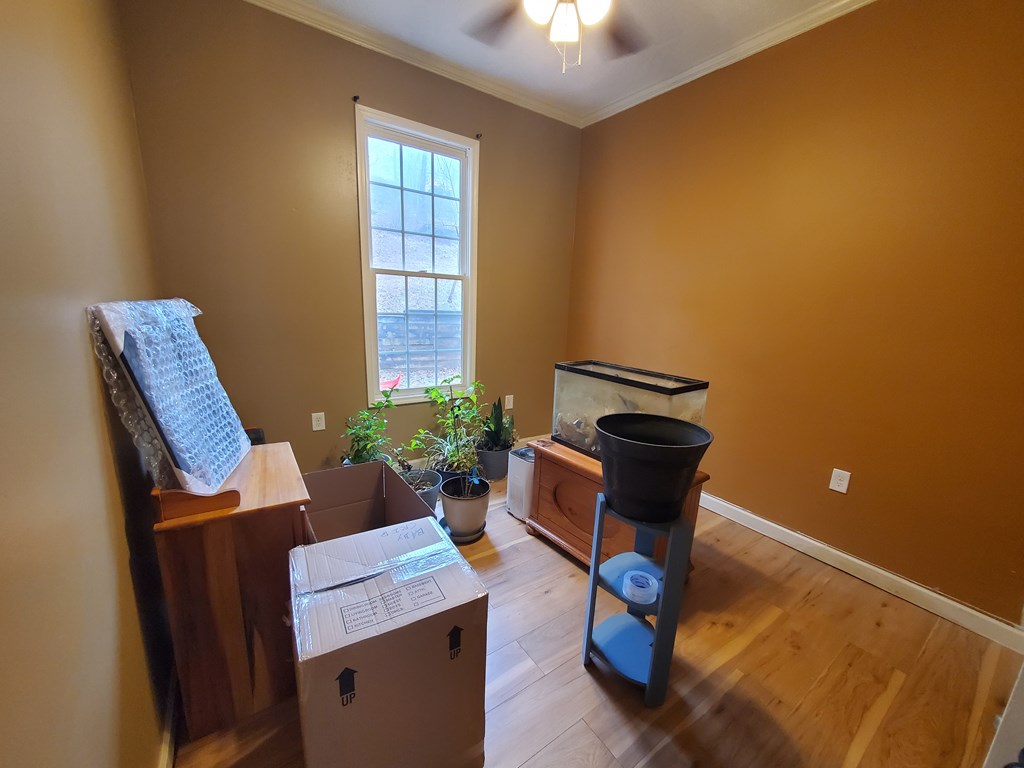 192 Mill Pond Court Jasper, GA 30143 - Photo 12 of 29 a living room with furniture and wooden floor