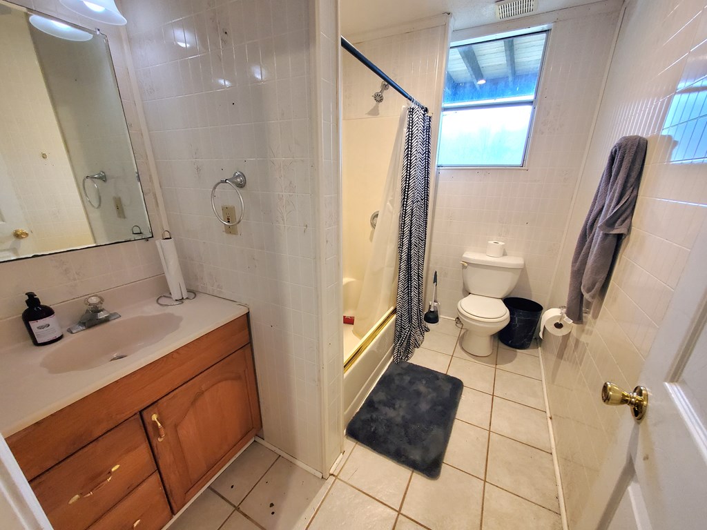 192 Mill Pond Court Jasper, GA 30143 - Photo 16 of 29 a bathroom with a sink and a mirror