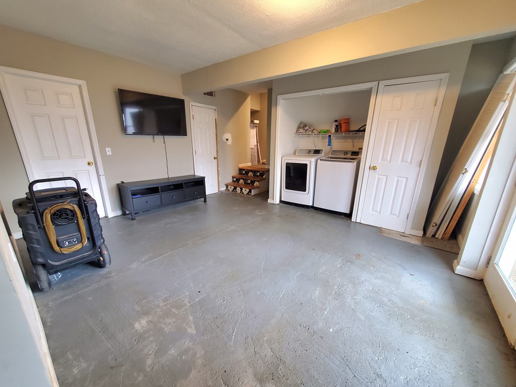 192 Mill Pond Court Jasper, GA 30143 - Photo 20 of 29 a view of a livingroom with furniture and a flat screen tv