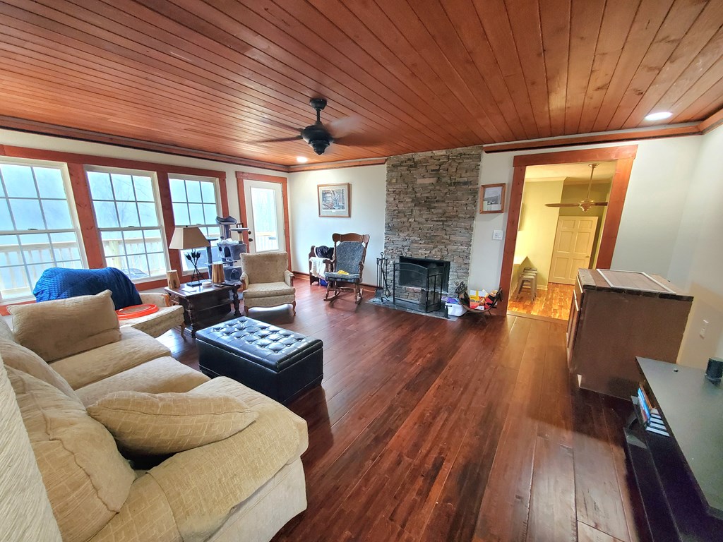 192 Mill Pond Court Jasper, GA 30143 - Photo 6 of 29 a living room with furniture and a fireplace