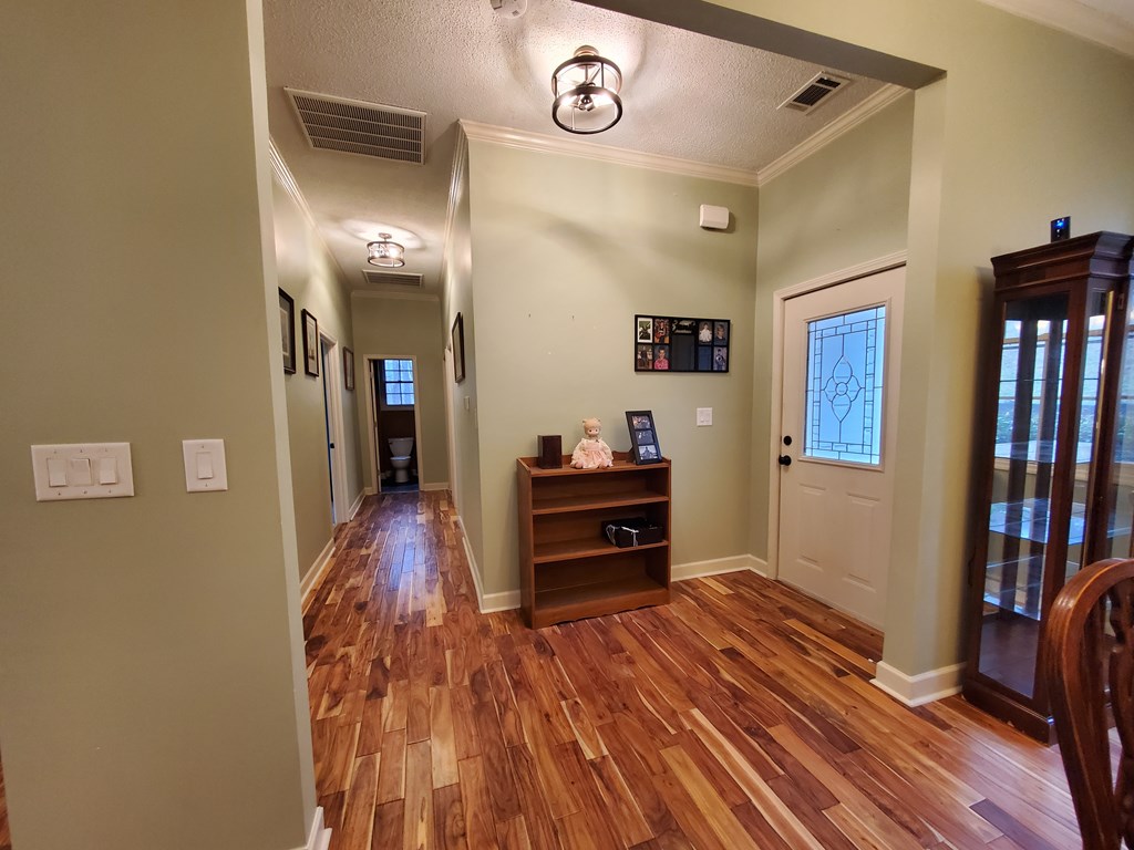 192 Mill Pond Court Jasper, GA 30143 - Photo 8 of 29 a living room with furniture and a flat screen tv