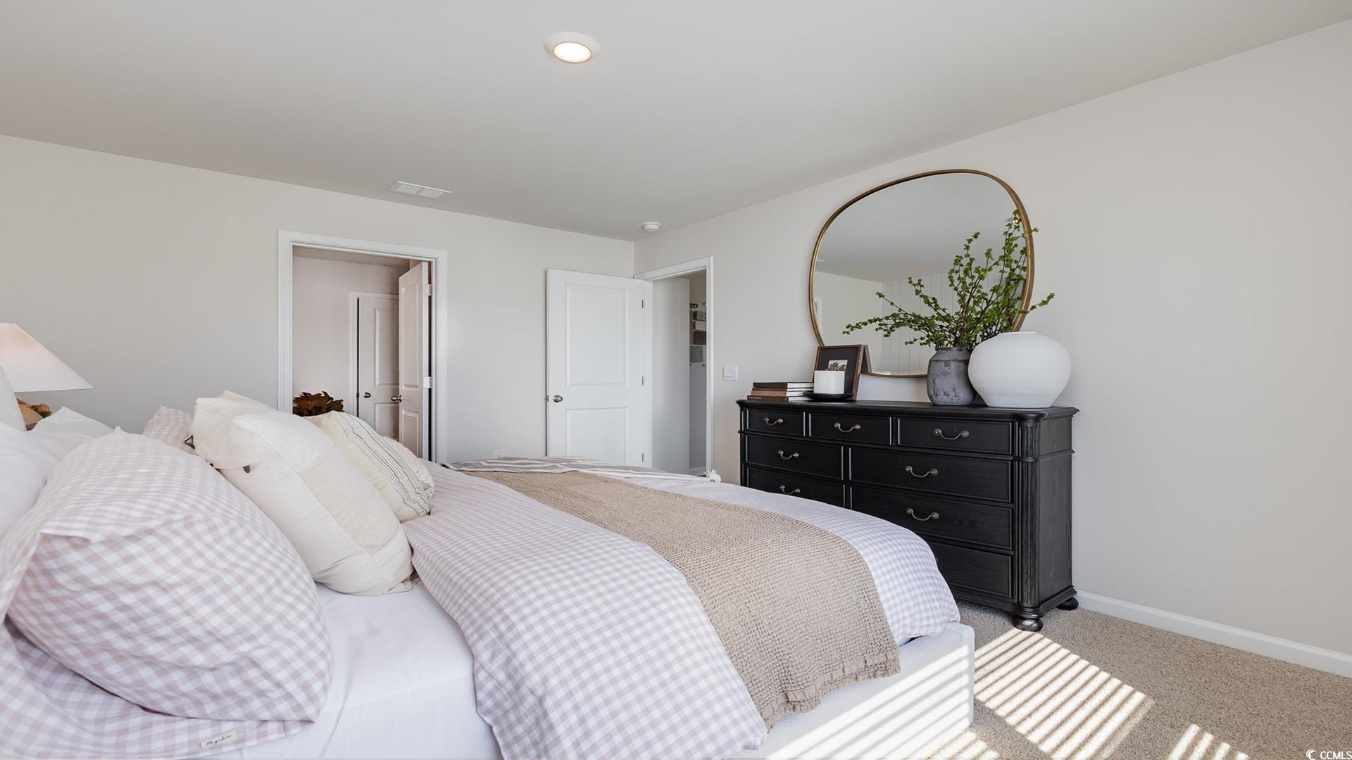 850 Farmers Passage Loop Loris, SC 29569 - Photo 15 of 28 Bedroom featuring light colored carpet and baseboards