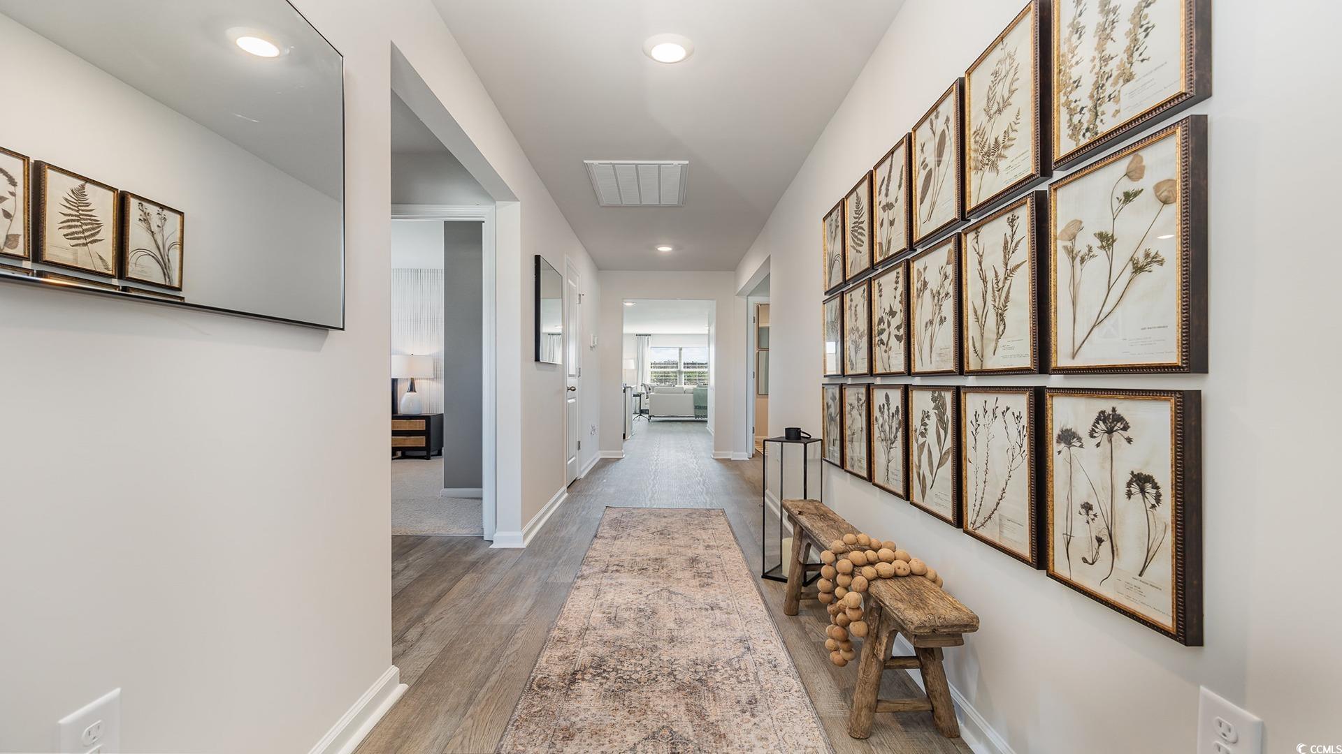 850 Farmers Passage Loop Loris, SC 29569 - Photo 3 of 28 Corridor featuring recessed lighting, baseboards, and wood finished floors