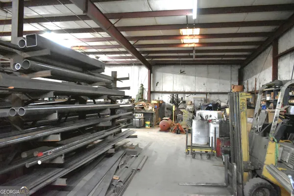 a kitchen with refrigerator and countertop