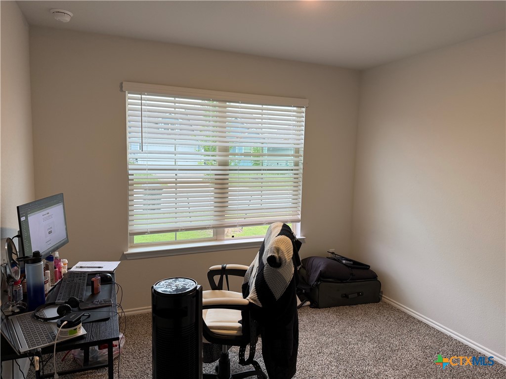 1335 Brookfield Street Temple, TX 76504 - Photo 15 of 15 a room that has a bed and a chair