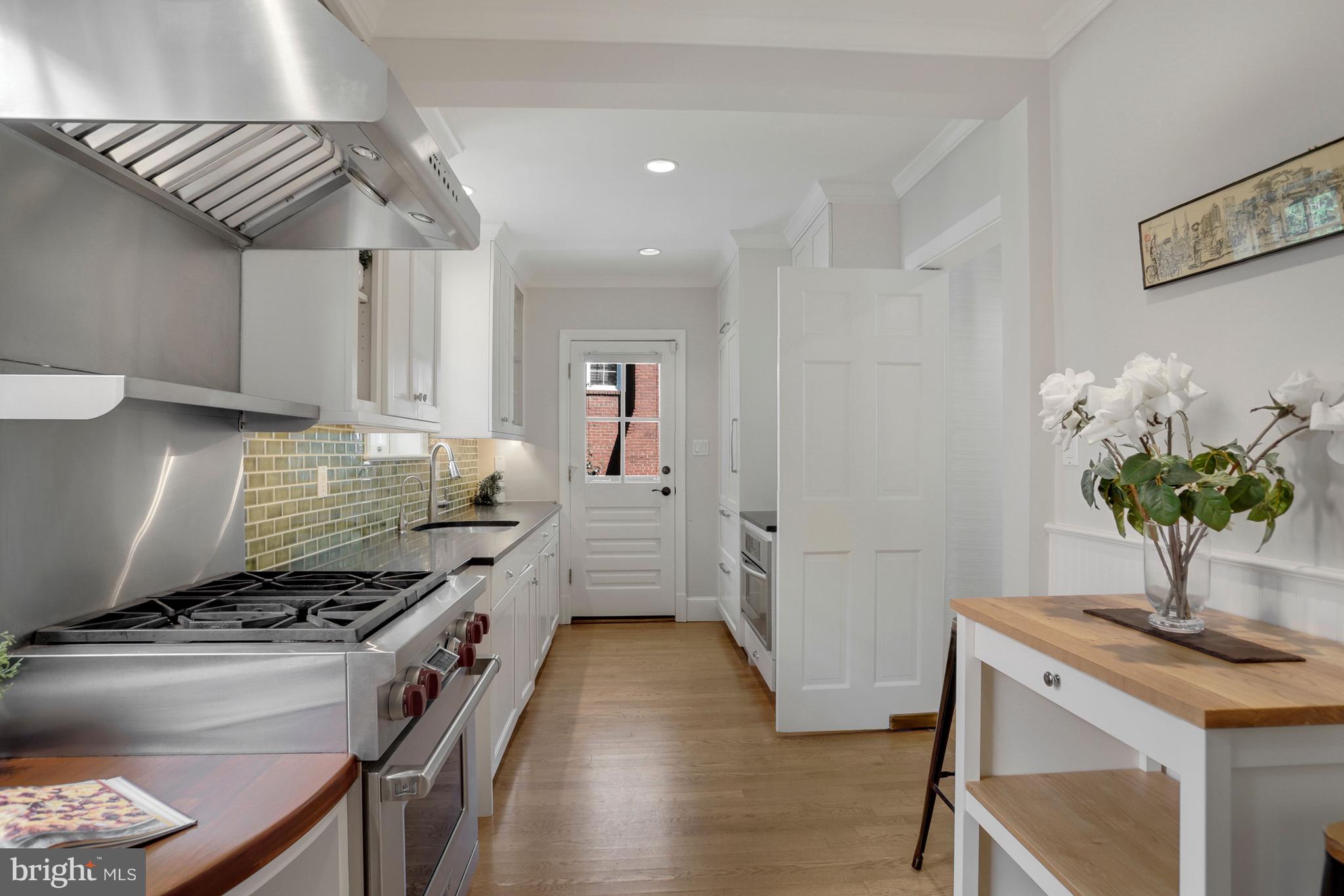 3501 30th Street Northwest Washington, DC 20008 - Photo 8 of 41 Lovely kitchen has ample storage, Sub Zero, Wolf