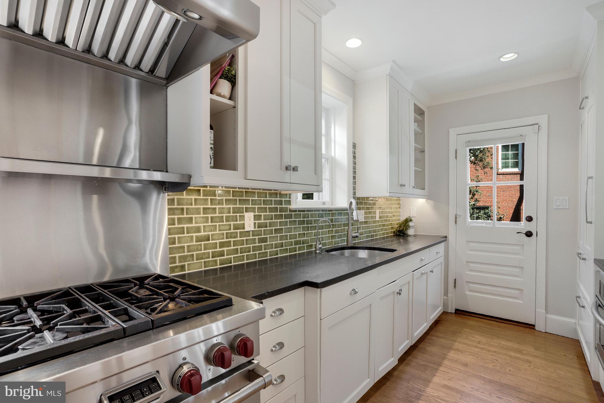 3501 30th Street Northwest Washington, DC 20008 - Photo 9 of 41 Kitchen features Granite counters, wood floors