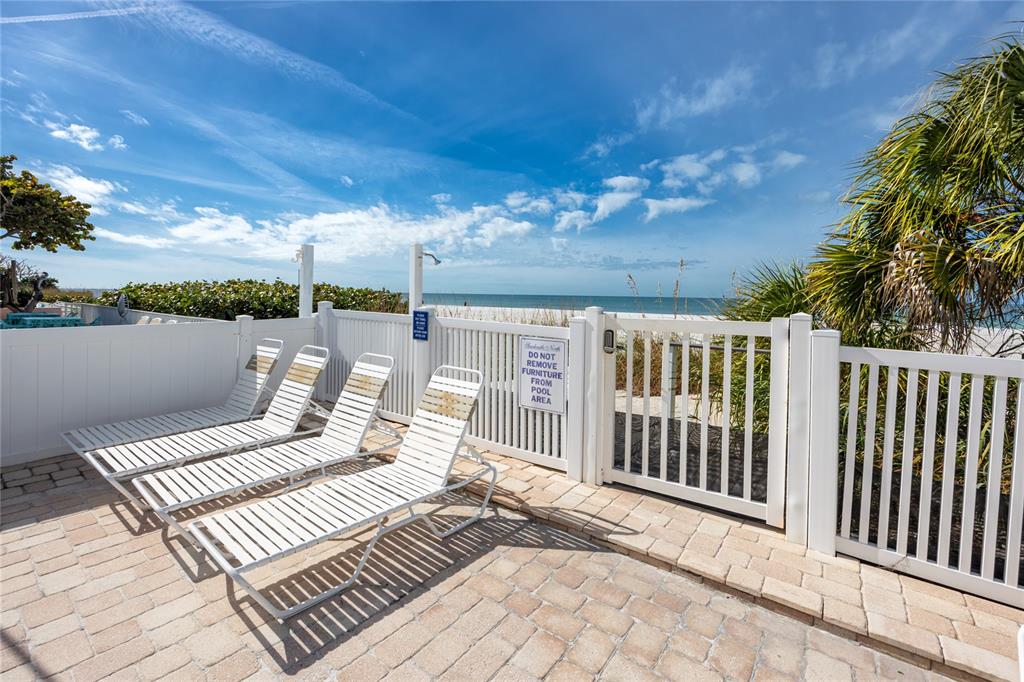 1300 Gulf Boulevard, Unit 301 Indian Rocks Beach, FL 33785 - Photo 33 of 46 a view of a balcony with furniture