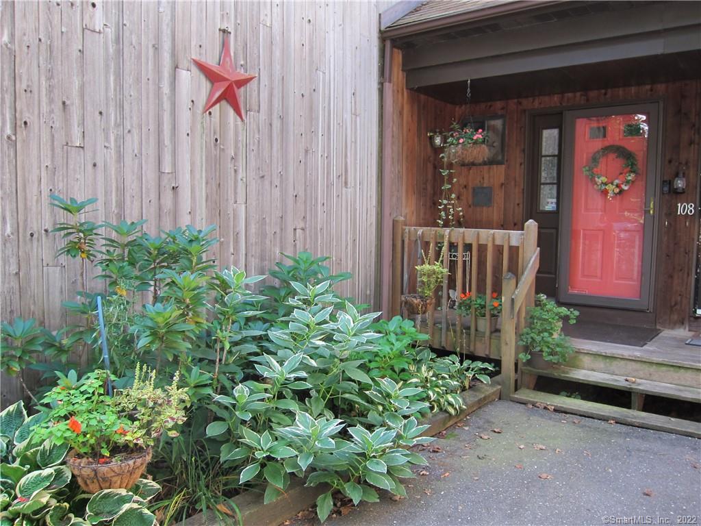110 Potuccos Ring Road Wolcott, CT 06716 - Photo 1 of 1 a view of a entryway door of the house