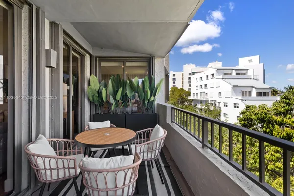 a view of a balcony dining area