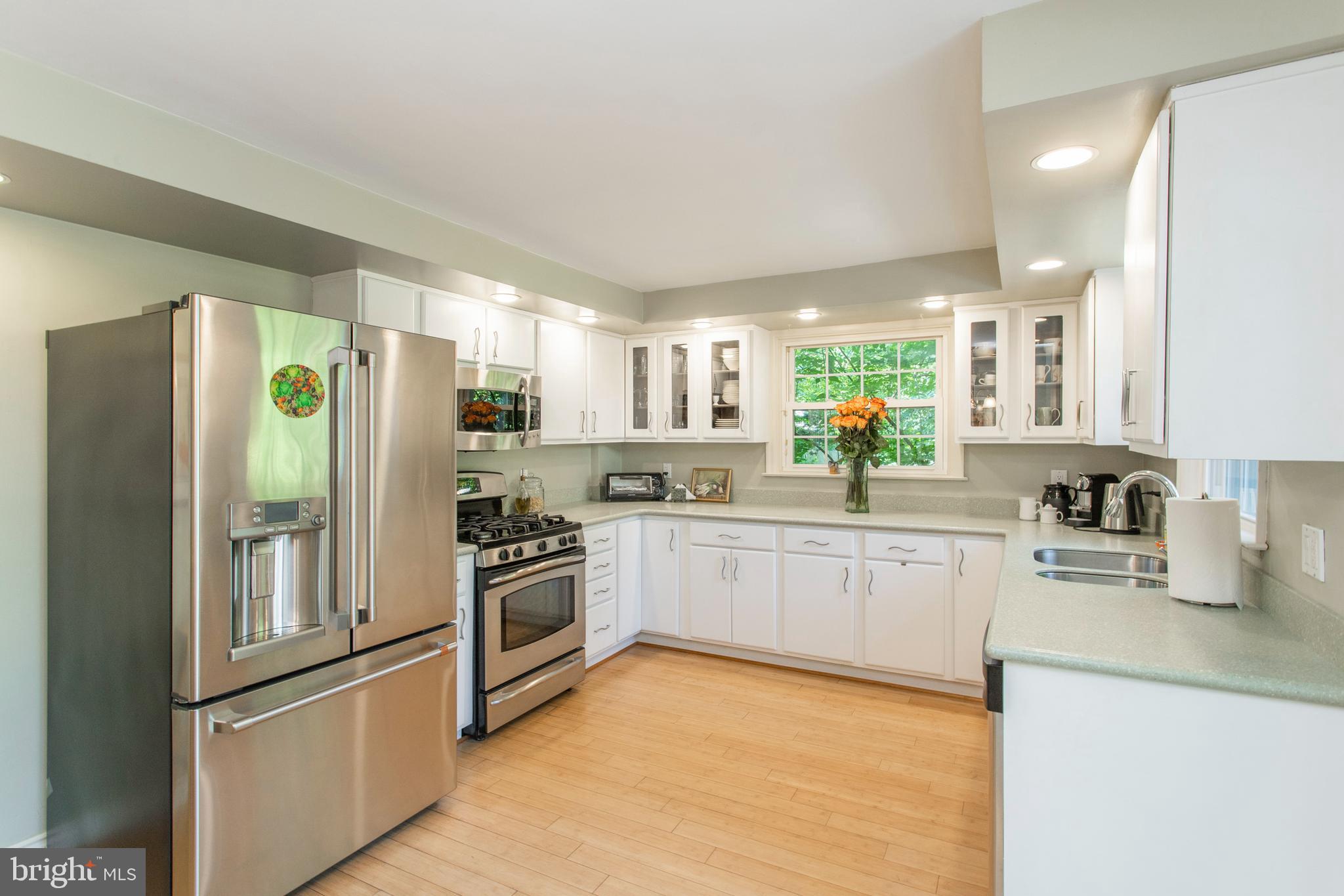 603 Laverock Road Glenside, PA 19038 - Photo 16 of 72 White cabinetry/stainless appliances/bamboo floor