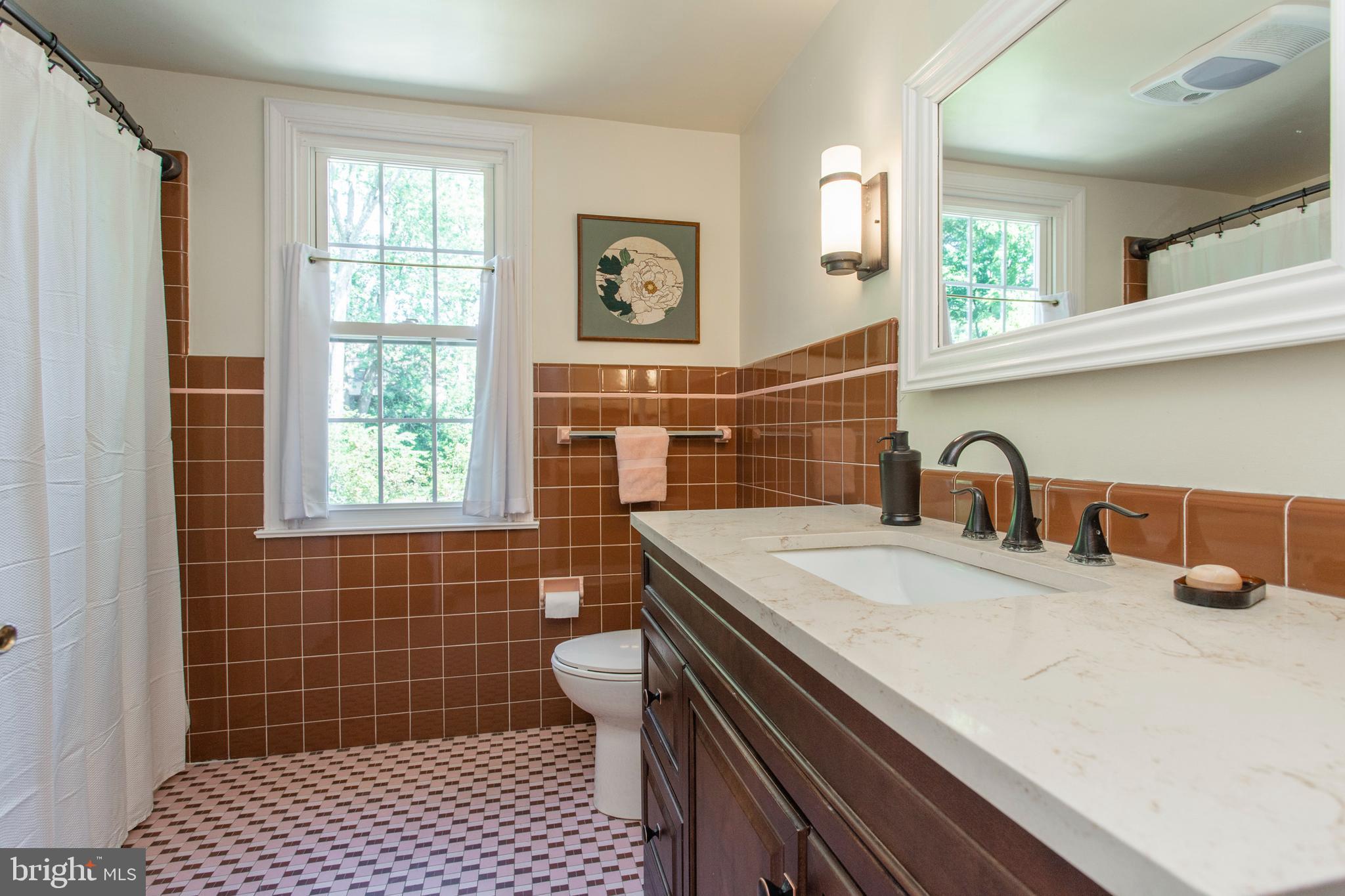 603 Laverock Road Glenside, PA 19038 - Photo 36 of 72 Hall bath with upgraded sink/vanity, toilet.