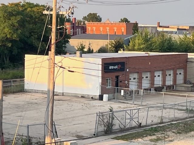 603 2nd Avenue Rochelle, IL 61068 - Photo 2 of 15 a view of a brick house with large windows