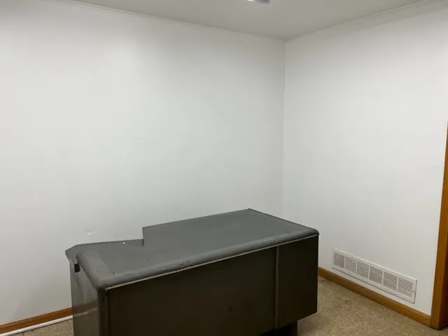 a room with storage and utility