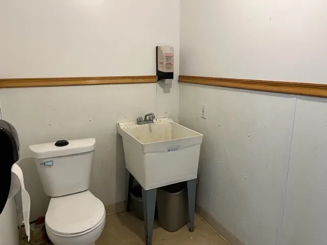 a view of a room with a table and chair