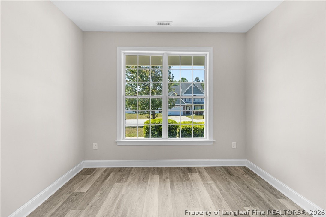 50 Huzzas Circle Cameron, NC 28326 - Photo 5 of 39 an empty room with a window